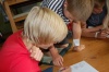 Little David helping Vojta correct my text Red Red Line. Which was a silly version of Red Red Wine